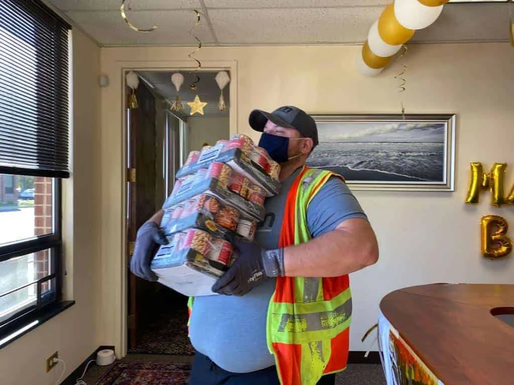 Carrying donated food packages